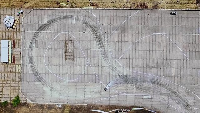 the car does drift on asphalt and burning tires