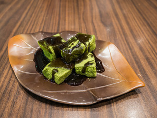 Green tea mochi with sweet syrup