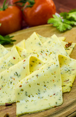 slices of cheese with spices