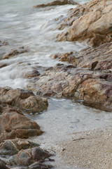 stones by the sea. waves of the sea from long exposure.