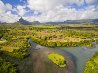 Fototapeta na wymiar Top down aerial view of Black River Tamarin - Mauritius beach. Curepipe Black River Gorge National Park in background