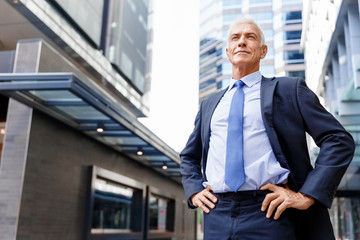 Portrait of confident businessman outdoors
