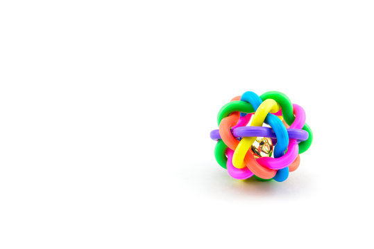 colourful dog ball toy isolated on a white background


