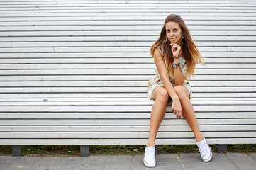 Obraz premium Beautiful stylish girl outdoor portrait