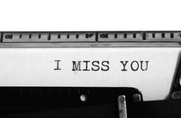 Typewriter. Typing text: i miss you - 116172055