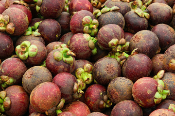 mangosteen is a popular and famous fruit in The market Thailand, mangosteen texture background.