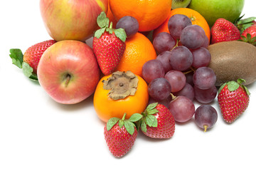 Naklejka na ściany i meble fresh juicy fruits and berries close-up on a white background