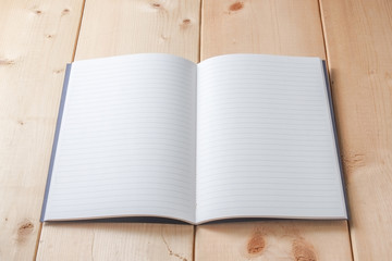Recycled paper book on wooden background