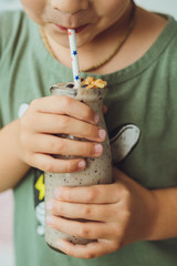 Cute Boy Drink Smoothie With Straw