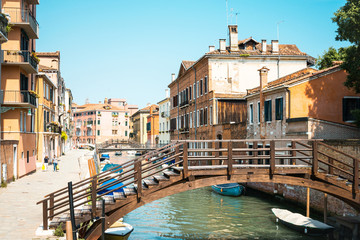 Fototapeta na wymiar VENICE, ITALY - June 30, 2016. Beautiful view of water street an