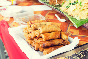 spring rolls and snacks at street market