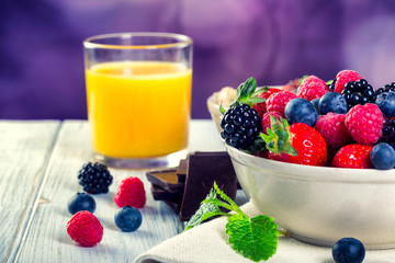 Bowl of fresh fruit. Bblackberries; raspberries; blueberries.