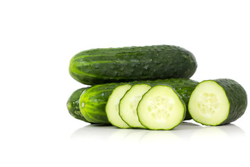 Cucumber, spanish type, over a white background.