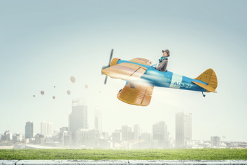 Girl flying old plane . Mixed media