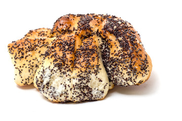 Sweet buns with poppy seeds on white background