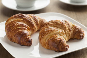 Dish with fresh baked croissants