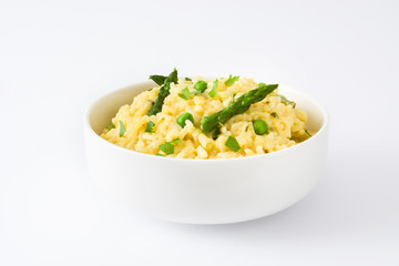 Risotto with asparagus and peas isolated on white background
