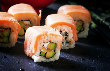 Rolls with avocado and salmon, selective focus