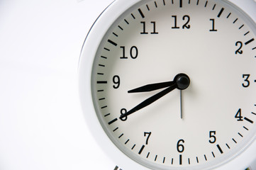 Fototapeta na wymiar White alarm clock isolated on white background