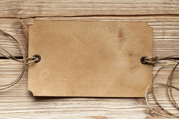 Paper label on wooden background