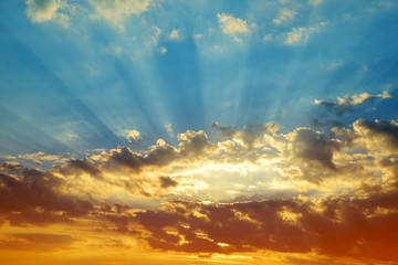 Colorful sky with clouds at sunset. Nature background. 