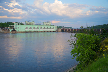 Fototapeta na wymiar Volkhov hydroelectric power station in the june twilight. Volkhov, Leningrad region, Russia