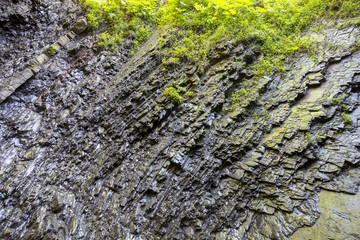 Layers of rocks under the influence of long-term water. Background
