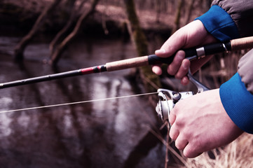 Fishing with rod on the river