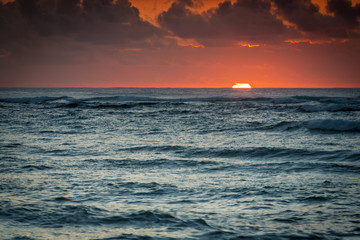 Sunrise/sunset above the ocean