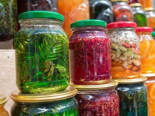 Glass jars of honey and jam
