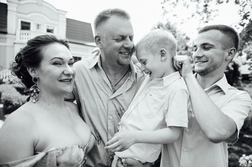 Portrait of Happy Family In Park - outdoor shot