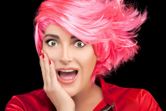 Surprised or flattered woman with pink hair