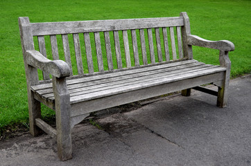 Wood bench in the park in Dudley, in the beautiful summer day .