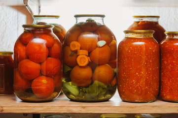 homemade marinated tomato and sauce standing on a shelf