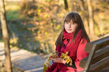 Autumn. The girl in the red coat.
