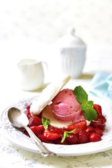 Strawberry dessert with coconut meringue,ice cream and strawberr