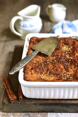 Cottage cheese casserole with cinnamon syrup.