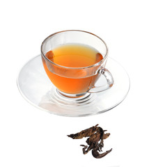 Glass cup of black tea isolated on white background