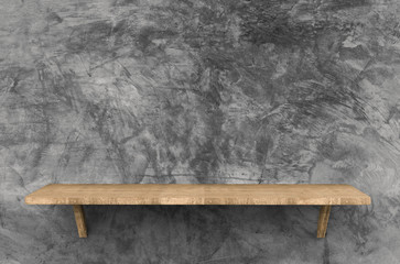 wooden shelf on cement background