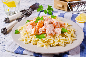 Pasta farfalle with salmon