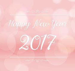 Happy new year 2017 with decoration on pink color abstract bokeh