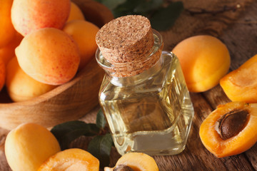 Healthy apricot oil in a glass bottle macro. horizontal
