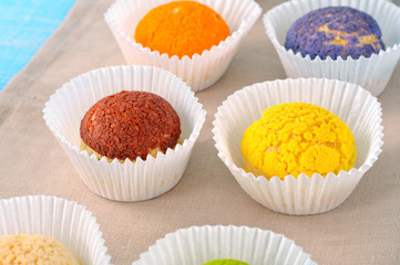 Set of different colorful cake shu eclairs
