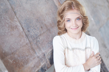 Portrait of cute blue eyes teenager girl.