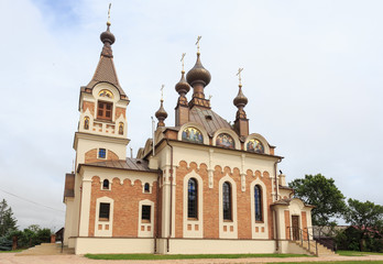 Cerkiew Opieki Matki Bożej w Sławatyczach – prawosławna cerkiew parafialna. Świątynia została poświęcona i oddana do użytku w 1912 roku - obrazy, fototapety, plakaty
