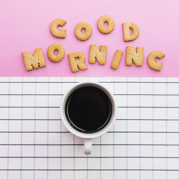 Fototapeta "Good Morning" inscription by cookies with cup of coffee or tea