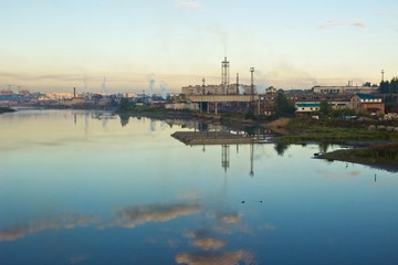 Fototapeta na wymiar Cityscape with river and factory