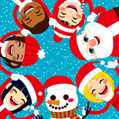Multiracial group of happy smiling children with Santa Claus and Snowman holding hands together in circle