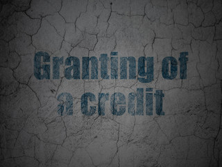 Currency concept: Granting of A credit on grunge wall background