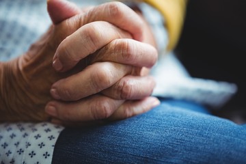 close-up of joined hands